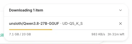 Unsloth download panel for unsloth/Qwen3.8-27B-GGUF UD-Q5_K_S: 7.1 GB of 20 GB, 983 KB/s, 3 h 31 m left.